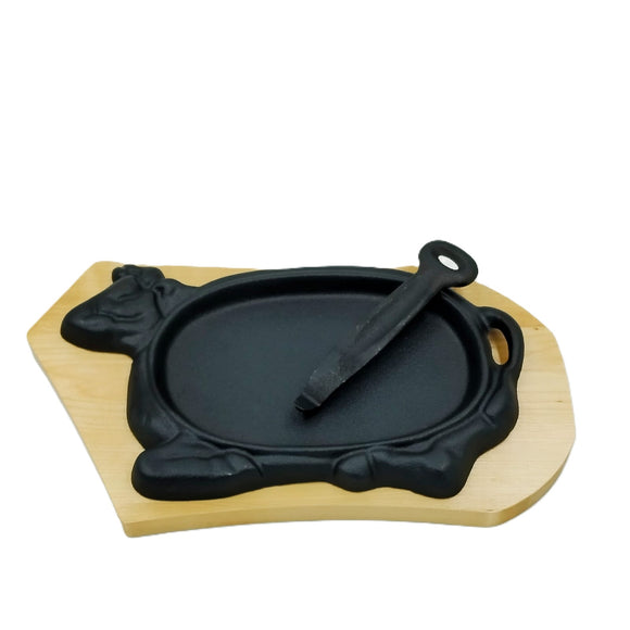 Plato fierro fundido base madera Vaquita 33 x 20 cms
