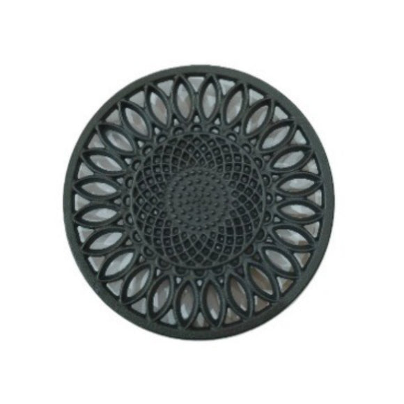 Salva mantel de fierro fundido color negro.